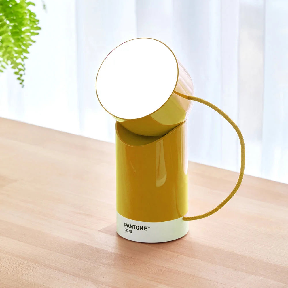 Yellow lexon orbe portable with storage shelves and support legs
