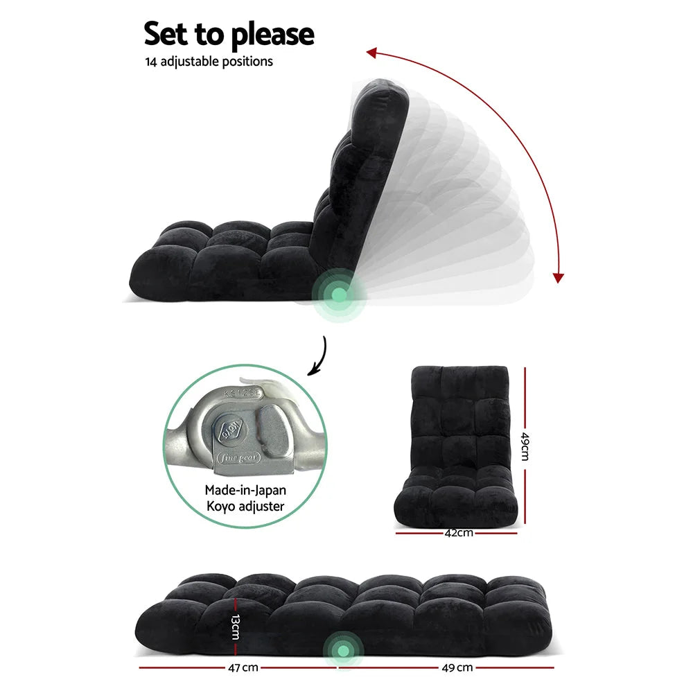Black floor lounge sofa with velvet cushion panels and foldable sofa base