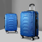 Blue storage trolley with handle rail and shelf tiers