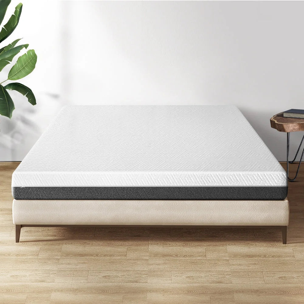 Mattress with foam layer and stitched cover