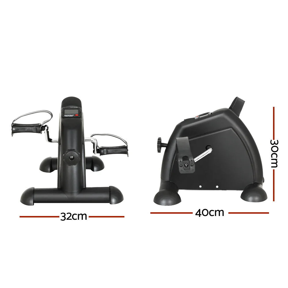 Exercise bike with portable pedal trainer and black foot straps
