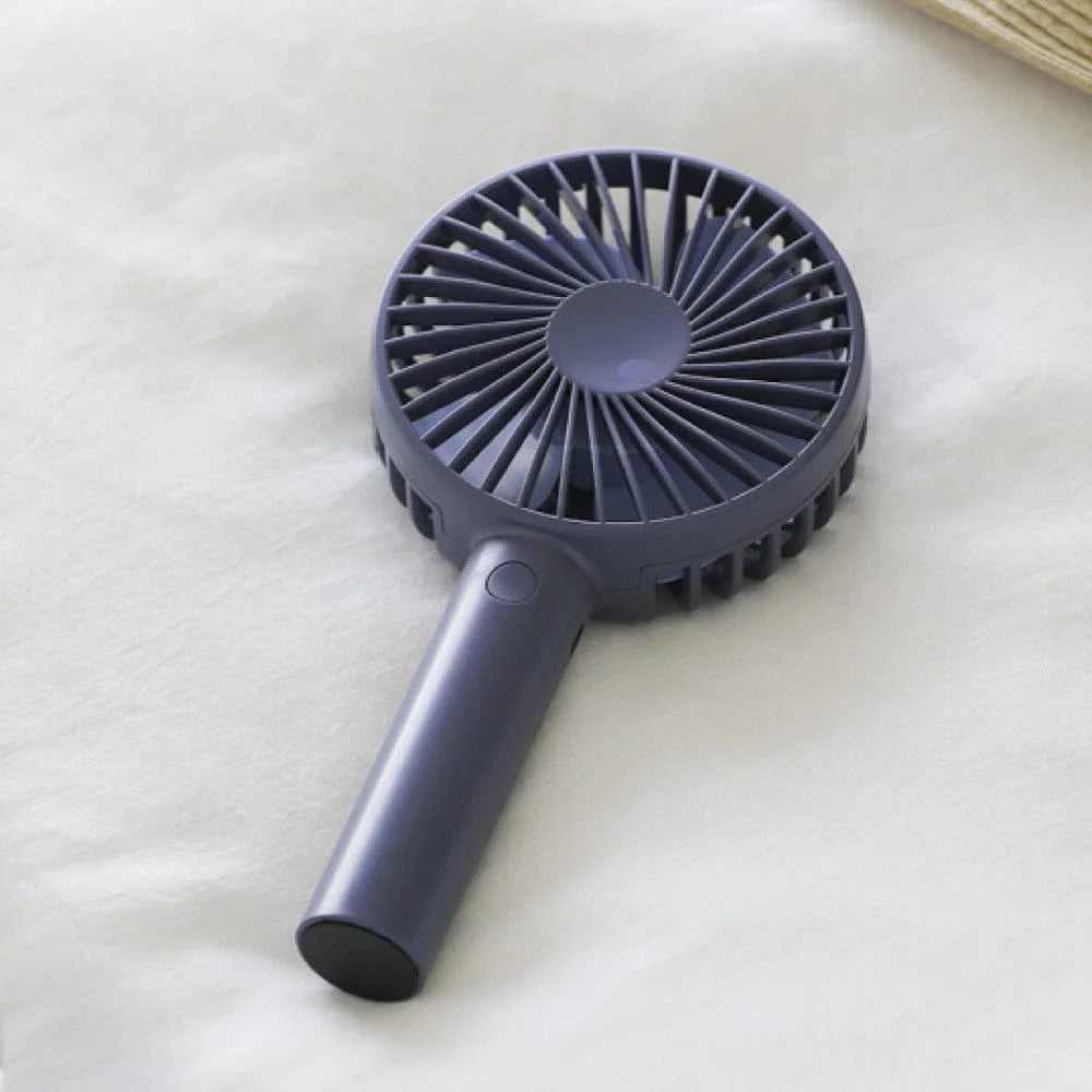 Table with mini usb rechargeable stand fan