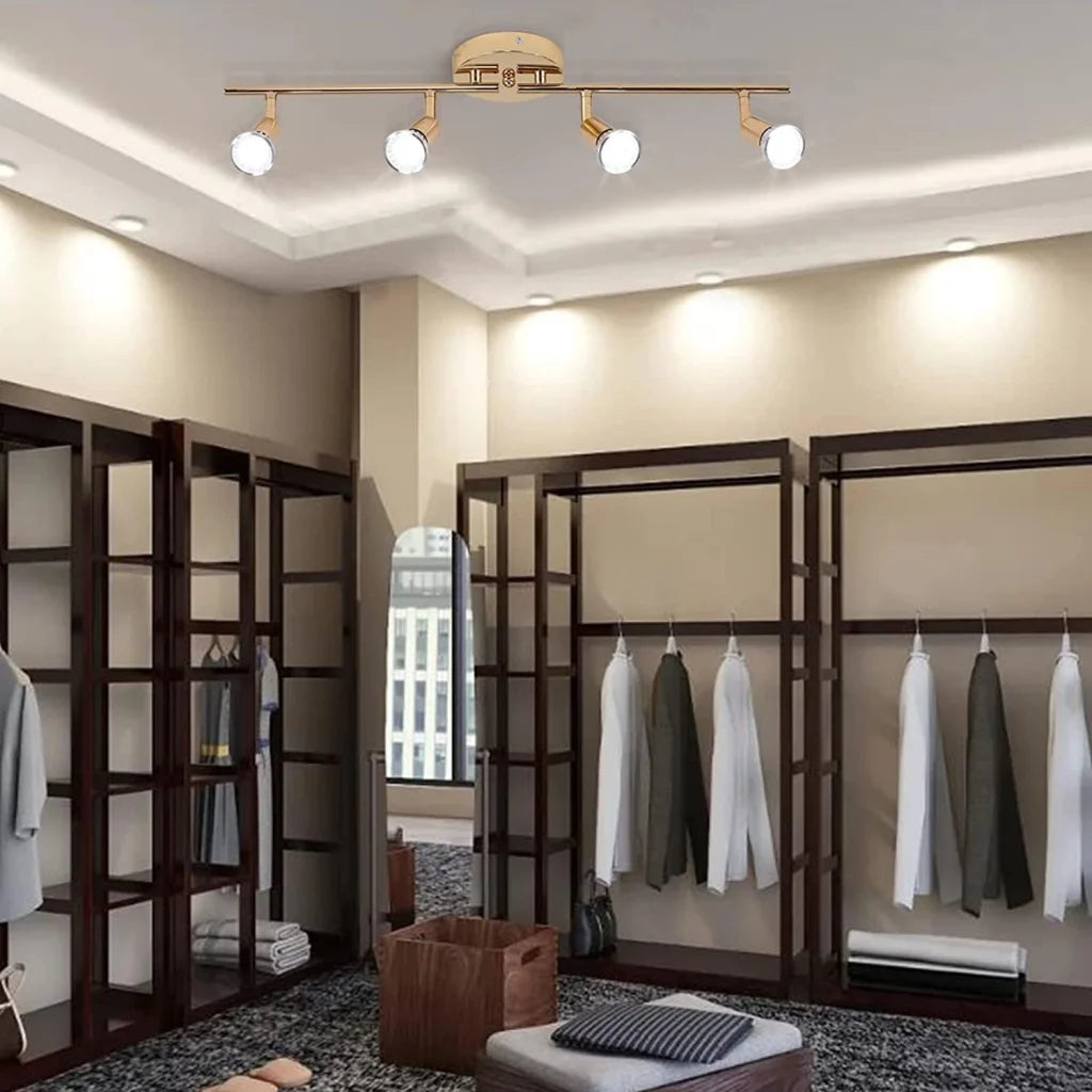 Gold modern light track with upright supports and shelf tiers