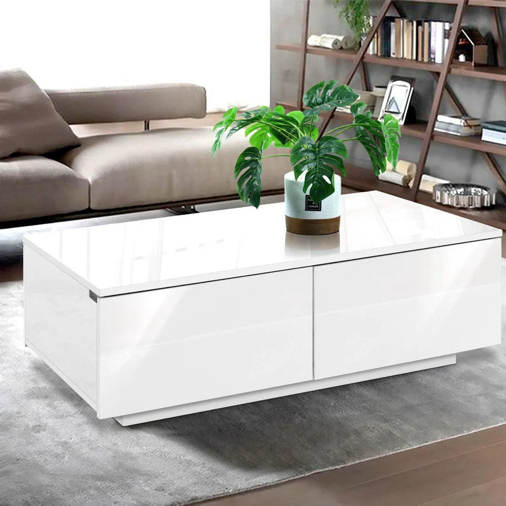 White coffee table with storage shelf beneath the tabletop