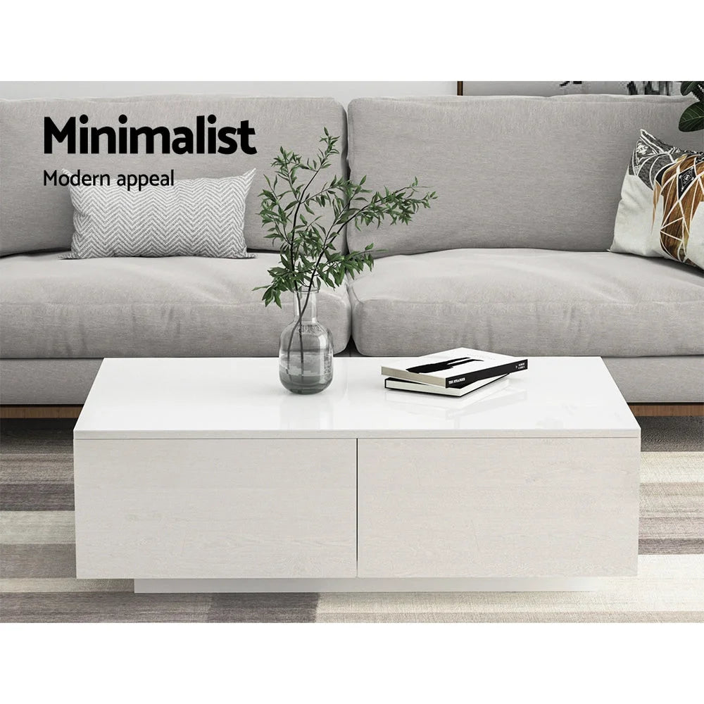 White coffee table with round tabletop and stable pedestal base