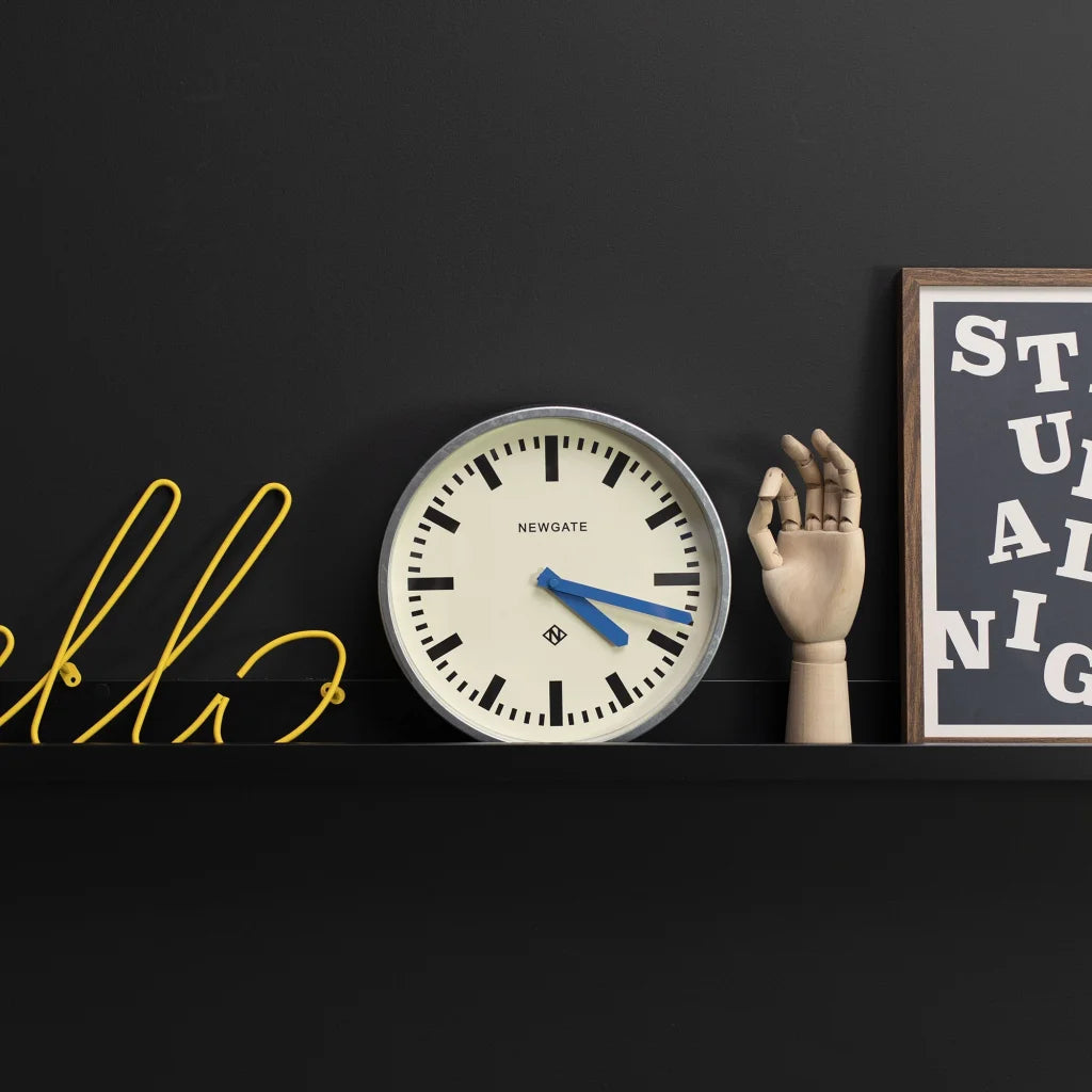 Newgate Luggage Wall Clock - Galvanised with Blue Hands