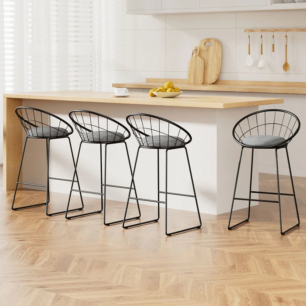 Set of four grey fabric bar stools