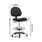 Black fabric office chair with upholstered seat and curved back