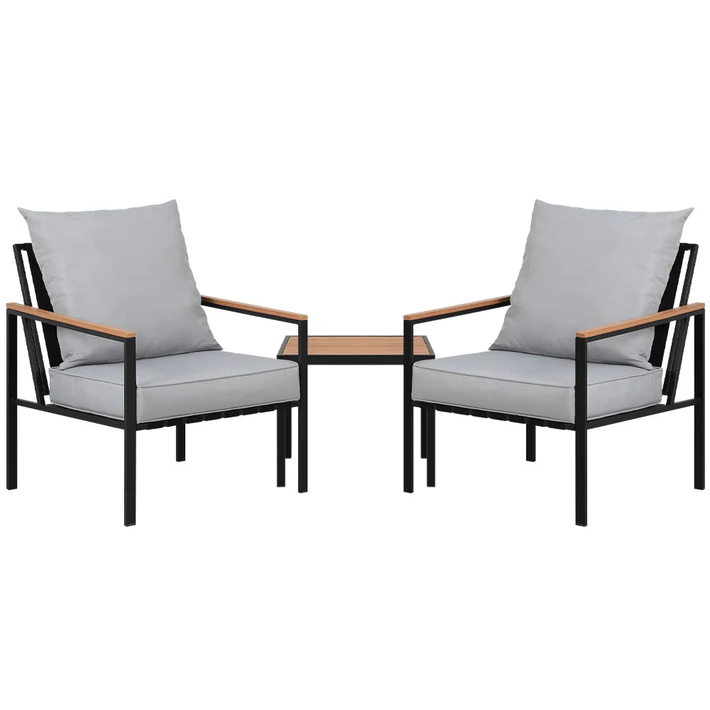 Black table with outdoor bistro lounge chairs