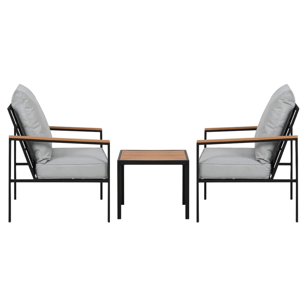Set of three black dining chairs