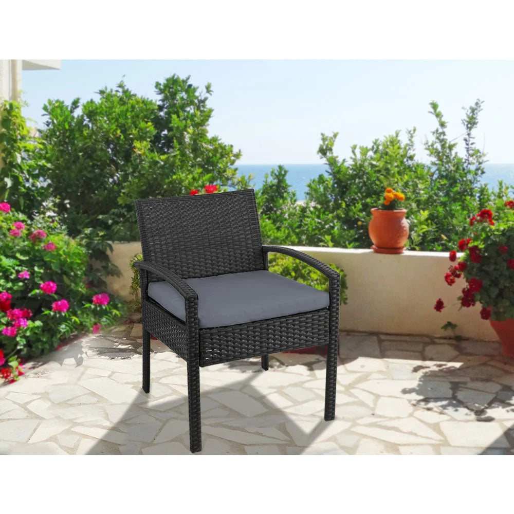 Outdoor bistro chair with hanging seat and curved stand frame