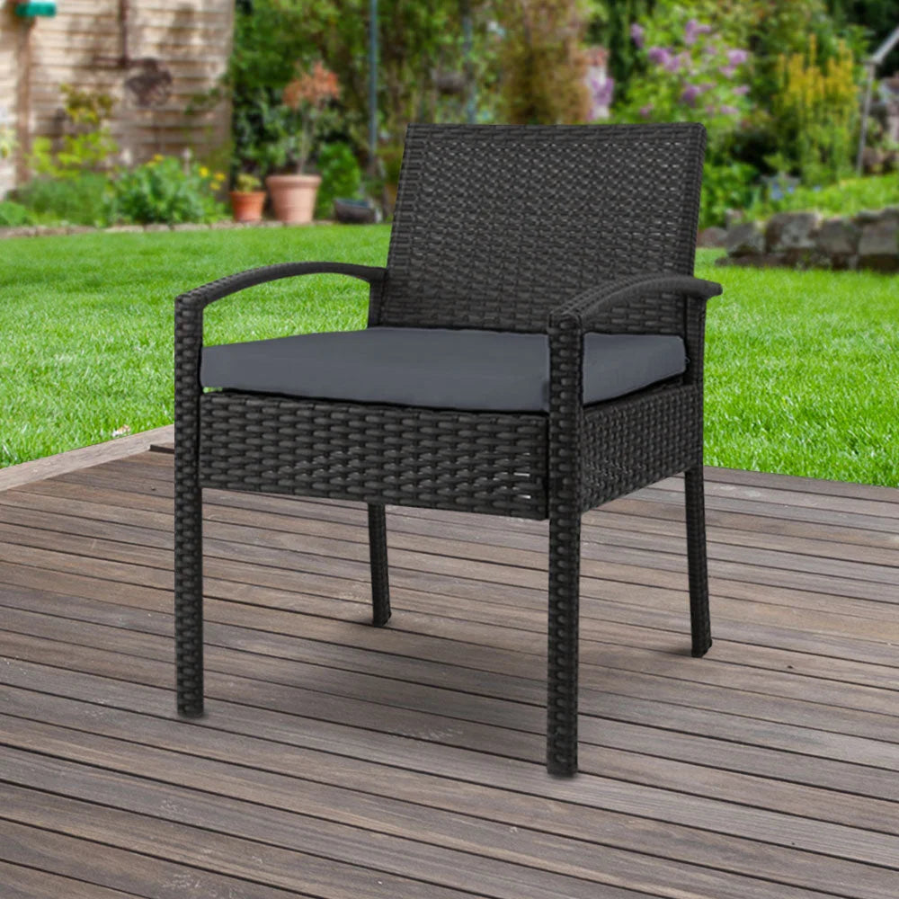 Black wicker outdoor bistro chair with upholstered seat and curved back