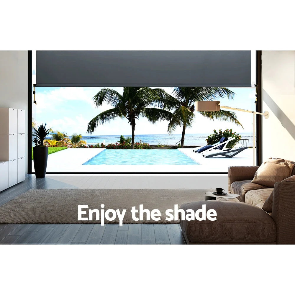 Grey 1x2 retractable awning with grey canopy fabric and articulated arms