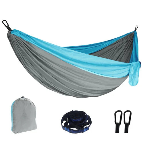 Outdoor hammock with fabric hammock bed and hanging ropes