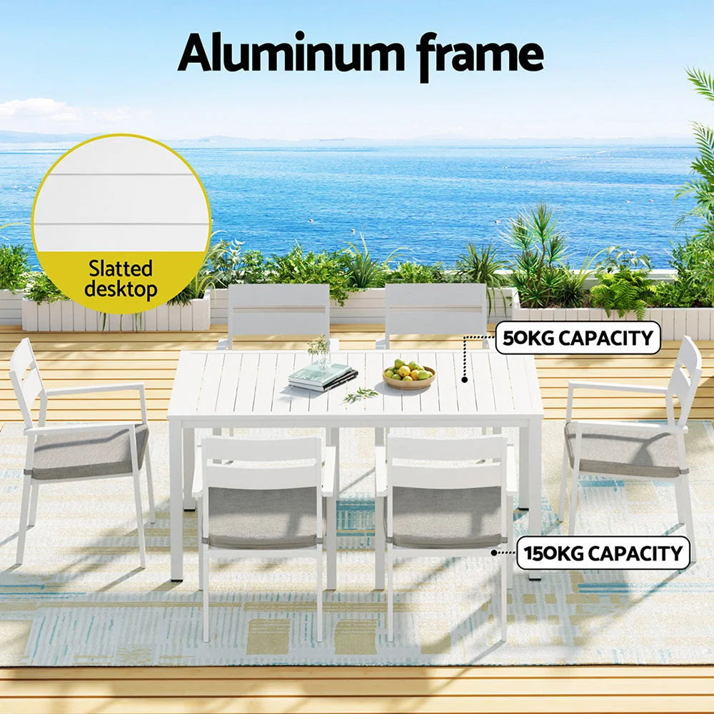 White aluminium outdoor lounge set with grey cushions and woven frame