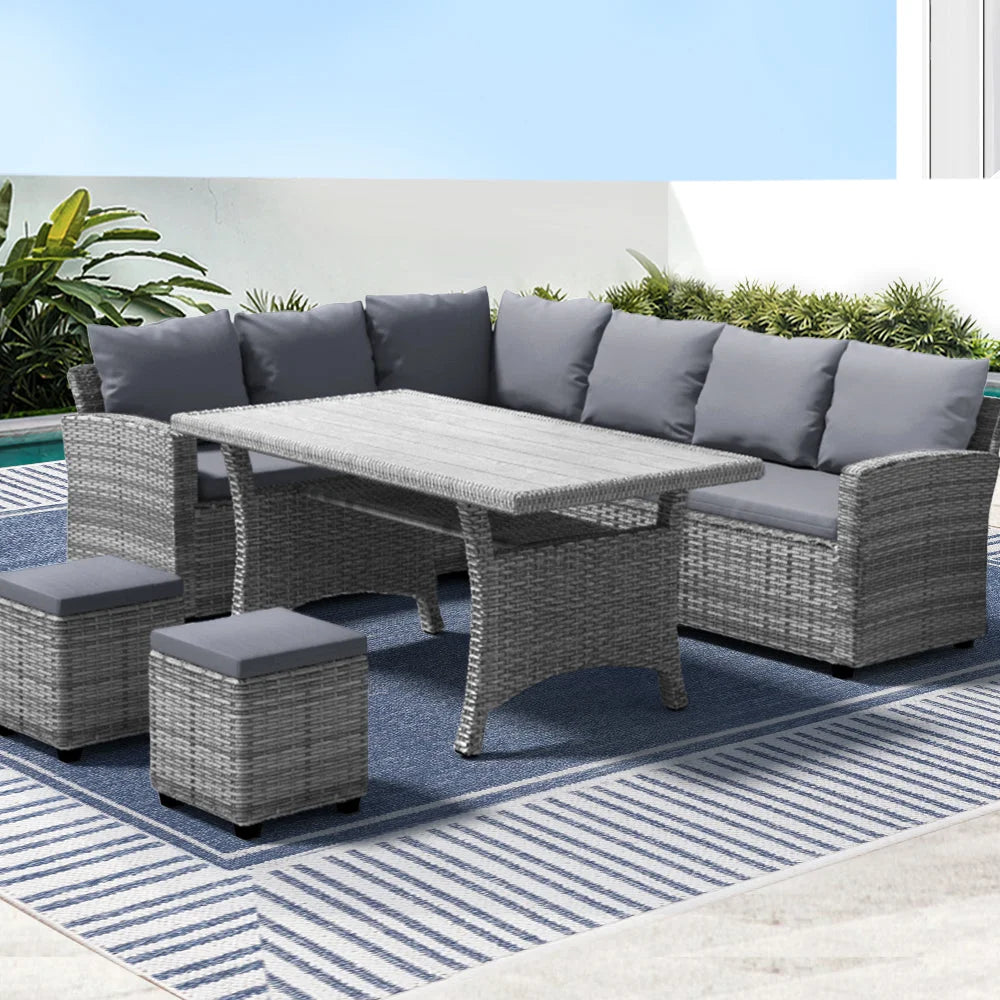 Wicker outdoor lounge set with grey cushions and woven frame
