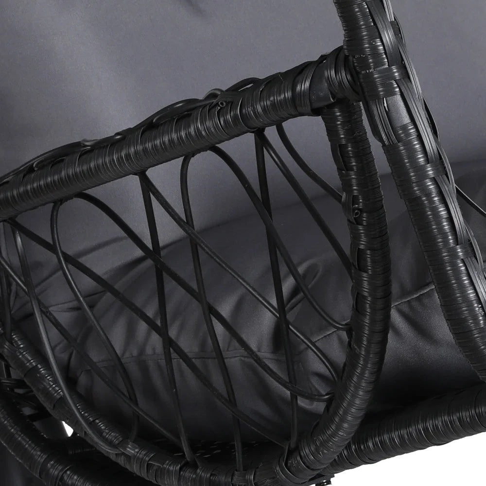 Black wicker swing chair with hanging seat and curved stand frame