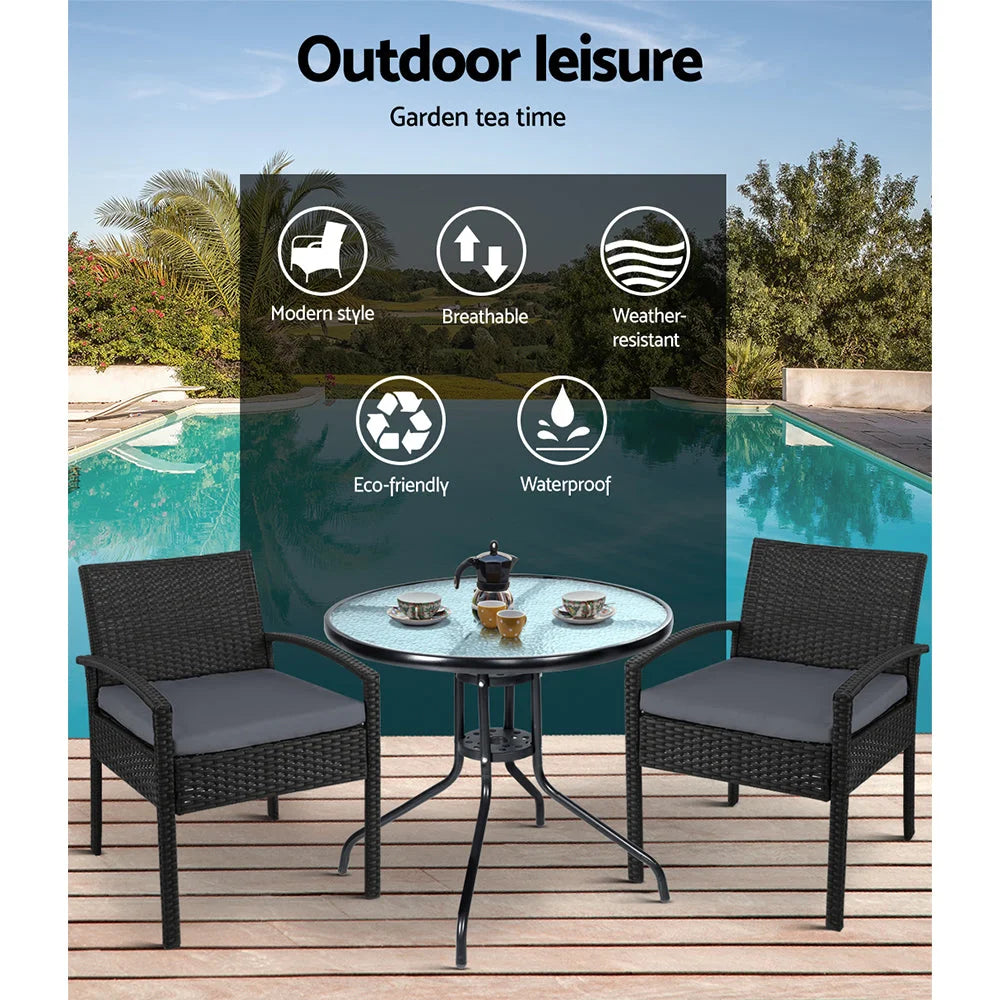 Outdoor sofa set with grey cushions and woven frame