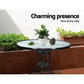 Black wicker outdoor sofa set with woven seating and matching table