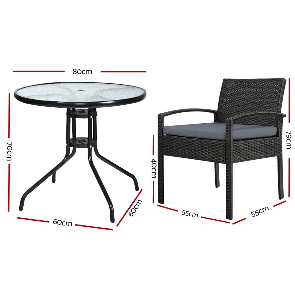Black wicker outdoor sofa set with seat cushions and low coffee table