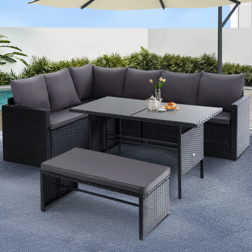 Black wicker eight seater outdoor dining setting