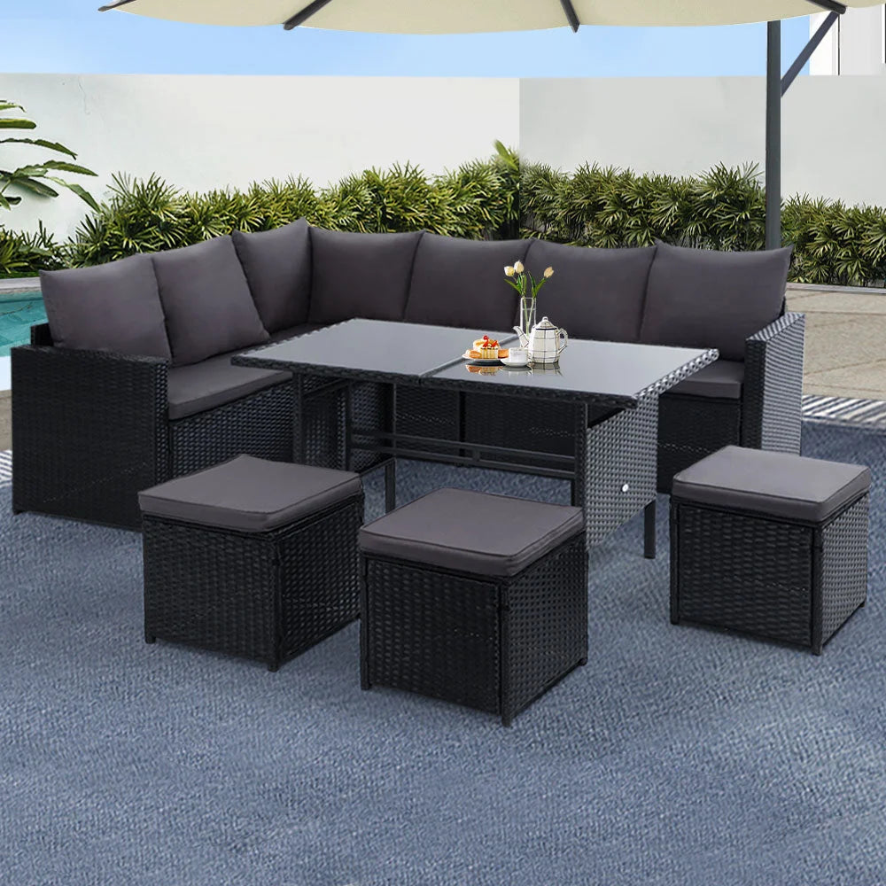 Black wicker outdoor lounge set with grey cushions and woven frame