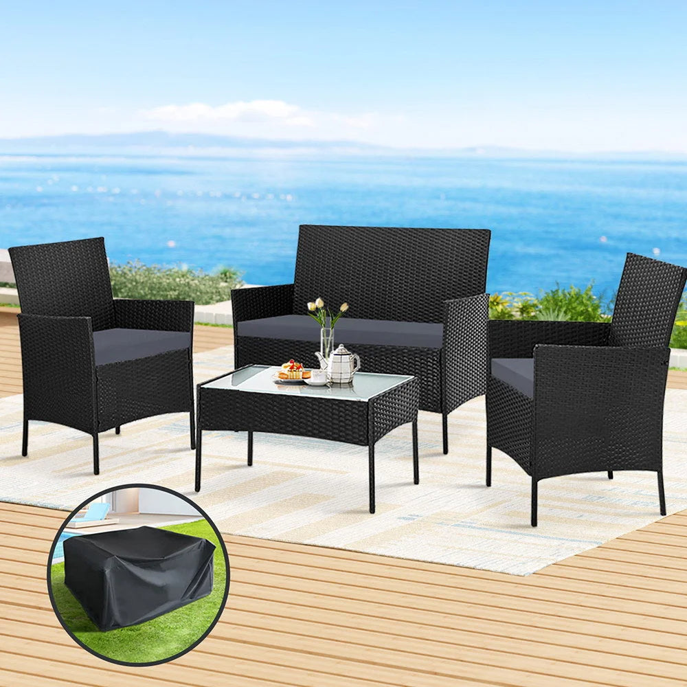 Black wicker outdoor lounge setting with sofa patio storage cover