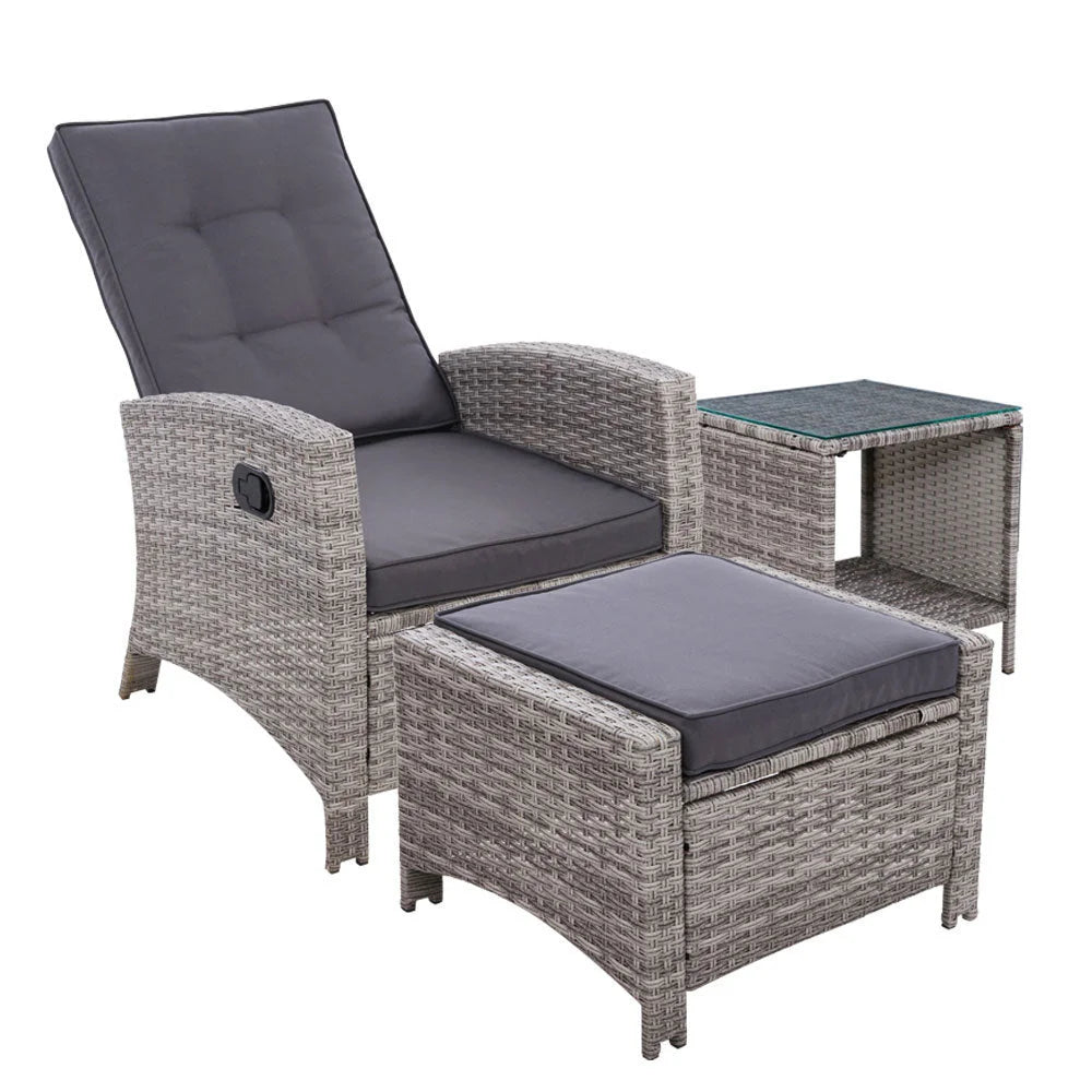Grey wicker outdoor lounge set with modular seats and cushion backs