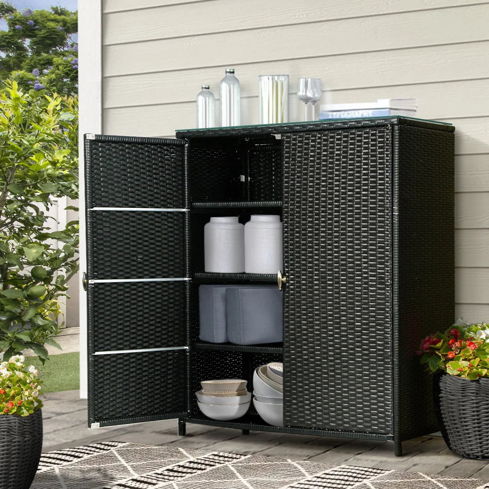Wicker storage cabinet with fitted handles and internal shelves