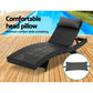Black wicker outdoor sun lounge with folding lounger seat and slatted footrest