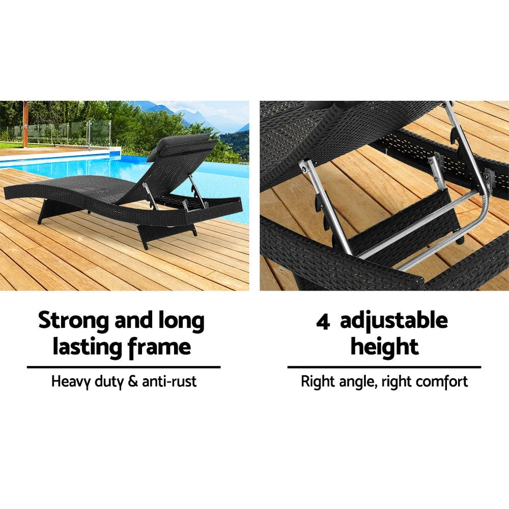Black wicker outdoor sun lounge with timber beach chair and wide armrests
