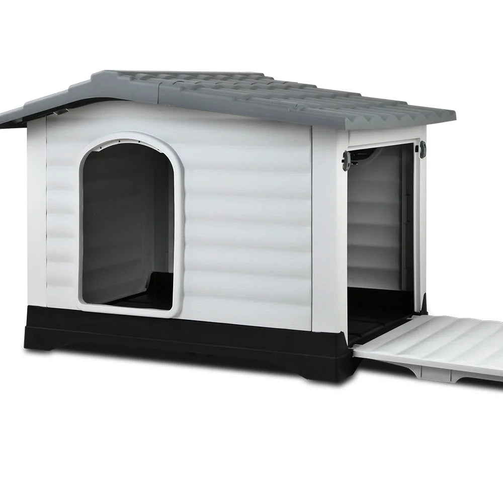 Grey dog kennel with grey kennel walls and sloped roof
