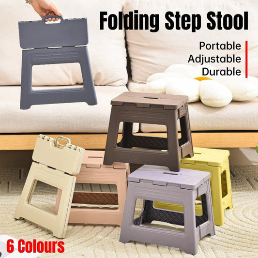 Plastic folding stool with collapsible plastic rings and carry strap