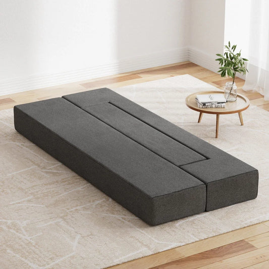 Grey mattress with foam layer and stitched cover