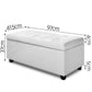 White leather PU storage ottoman in a room setting