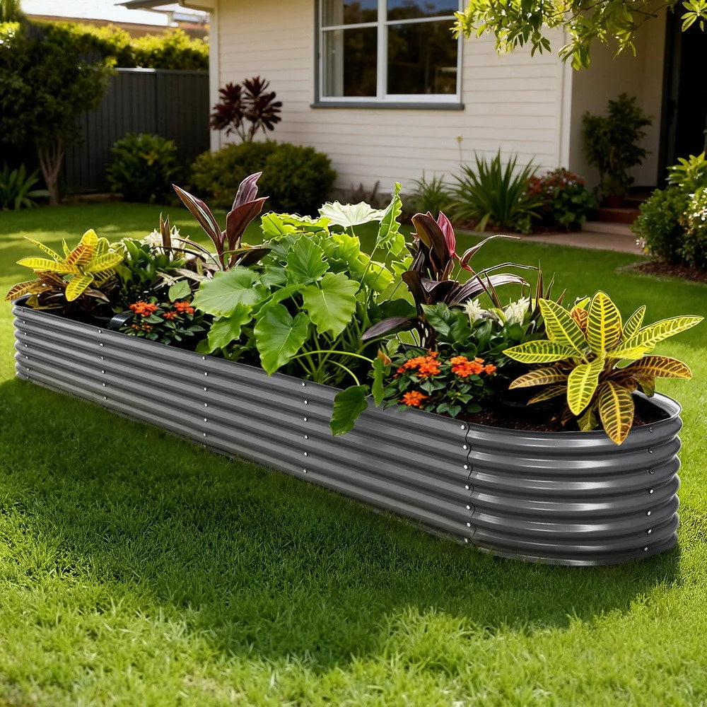 Steel raised garden bed with oval planter box and open soil area