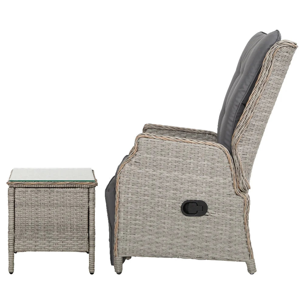 Grey wicker outdoor sun lounge with patio sun chair and matching low table