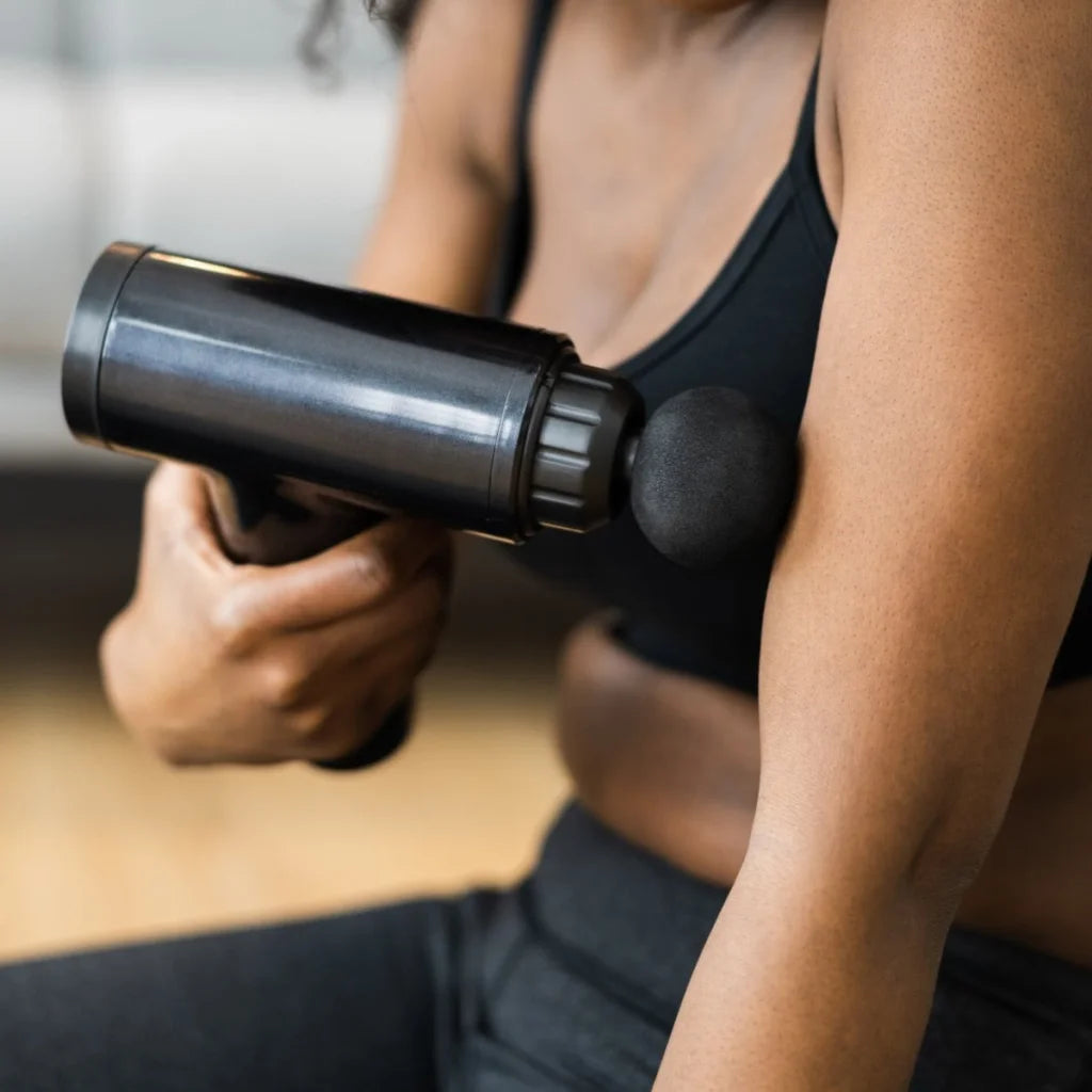 Remology Impact Therapy Percussive Massage Gun includes 4