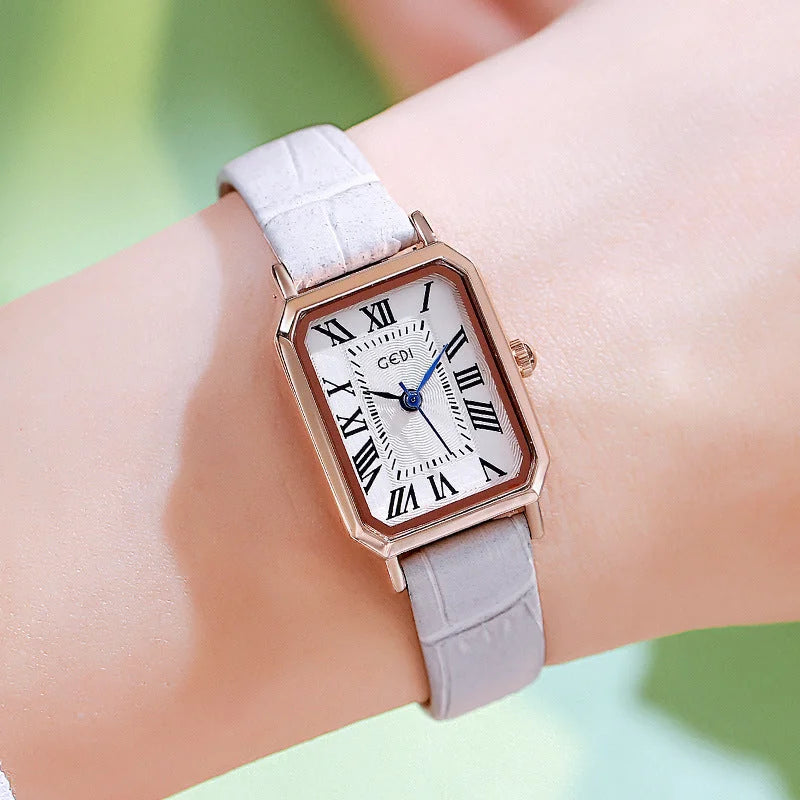 Rose gold case white dial grey belt Ladies Quartz Watch