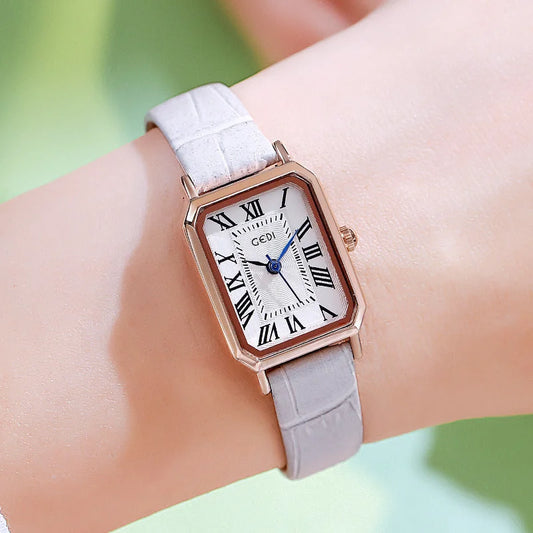 Rose gold case white dial grey belt Ladies Quartz Watch