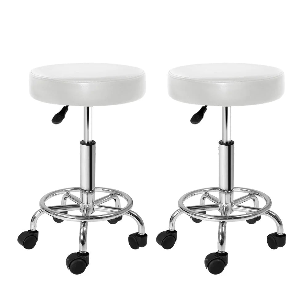 White bar stool set with counter-height legs and footrest