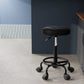 Black salon stool swivel with attachment points and product body