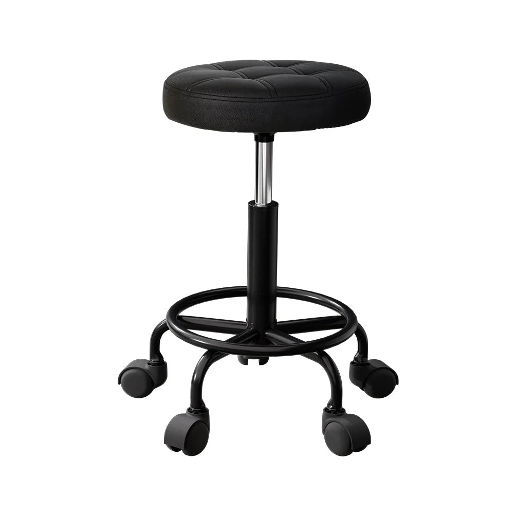 Black salon stool swivel with shape details and included parts