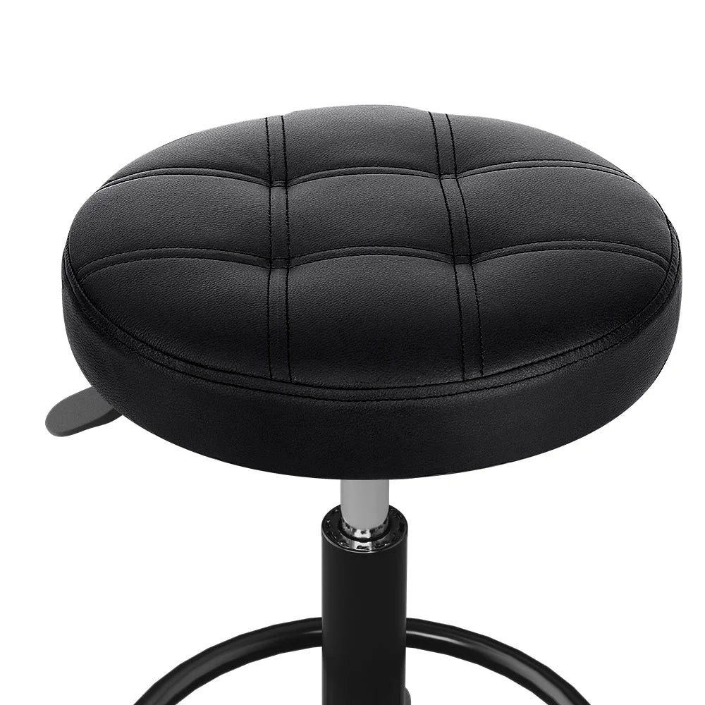 Black salon stool swivel with display setup and product form