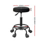 Black salon stool swivel with component details and storage context