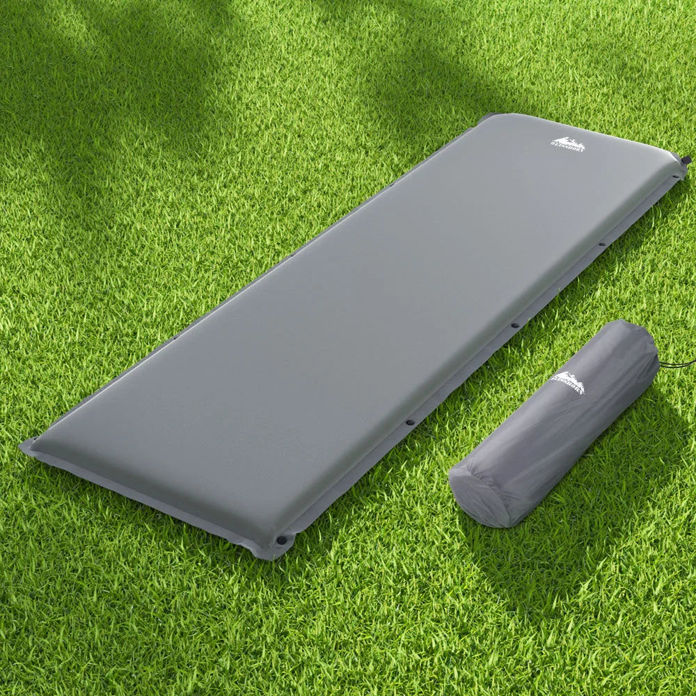 Grey 6cm mattress with layered cushioning and fabric casing