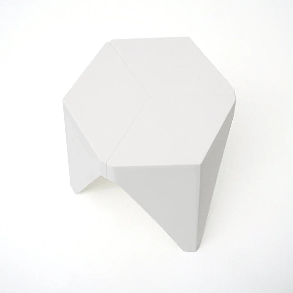 White plastic jigsaw puzzle board with attachment points and product body