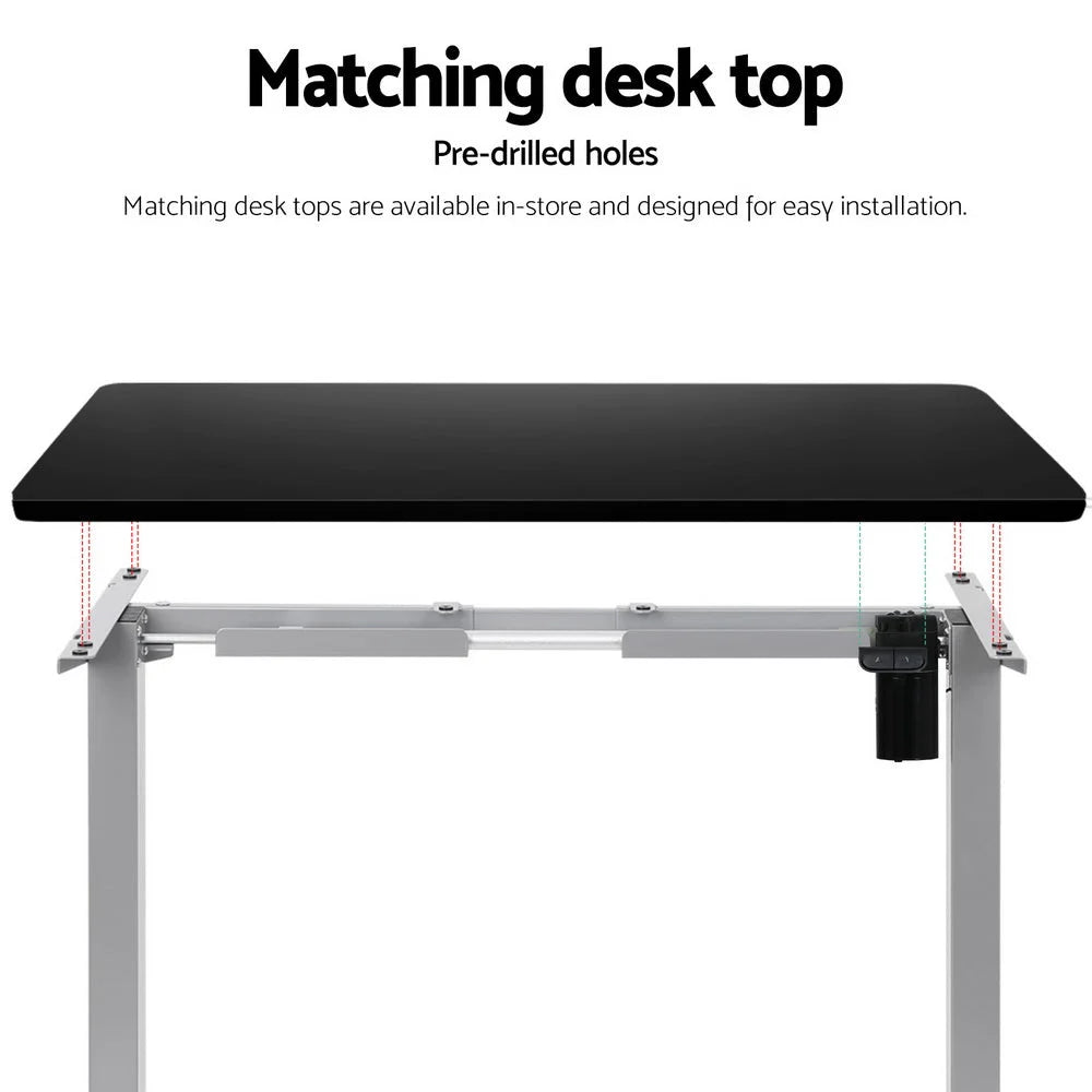 Grey standing desk with workstation surface and side shelves