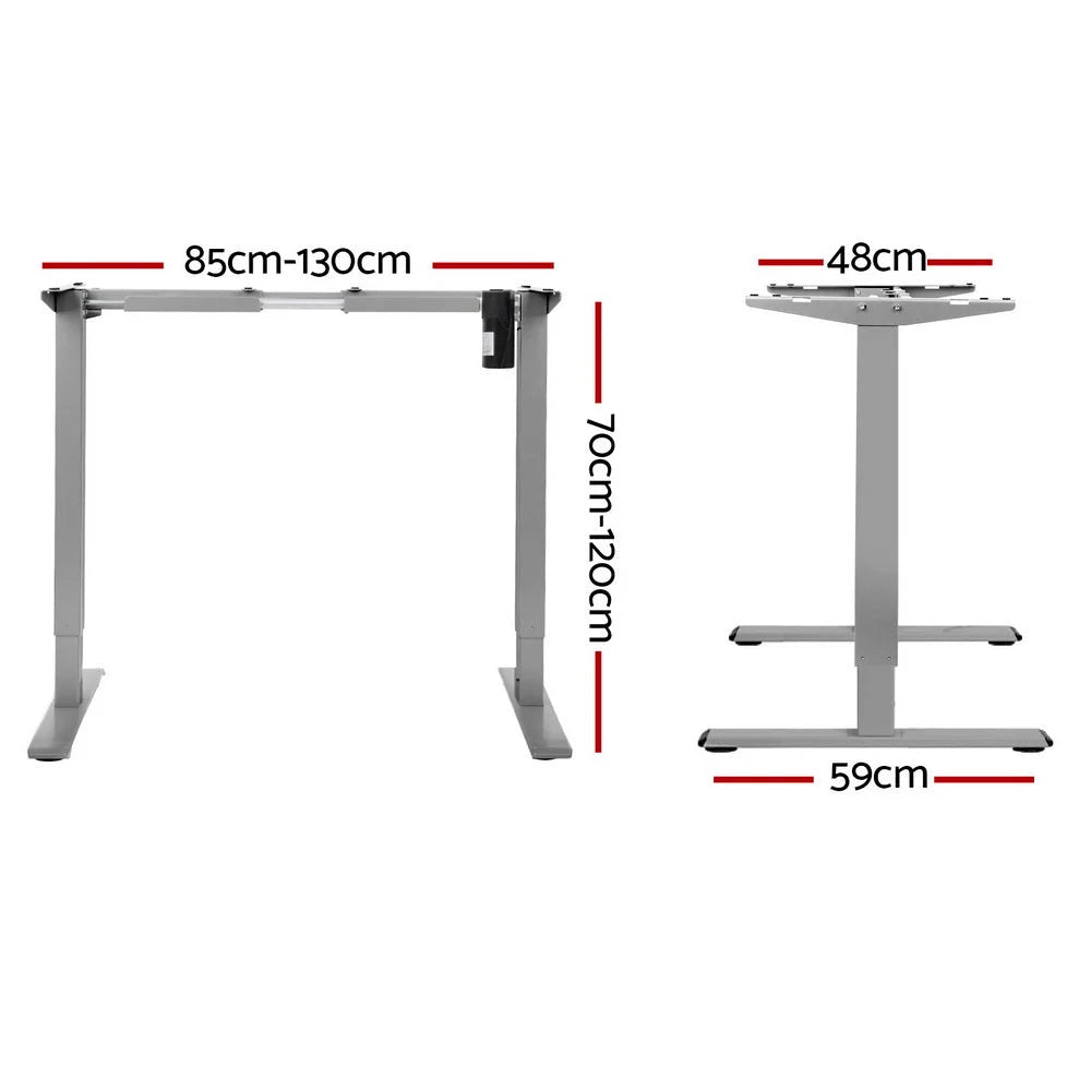 Grey standing desk with desktop shelf and metal side legs