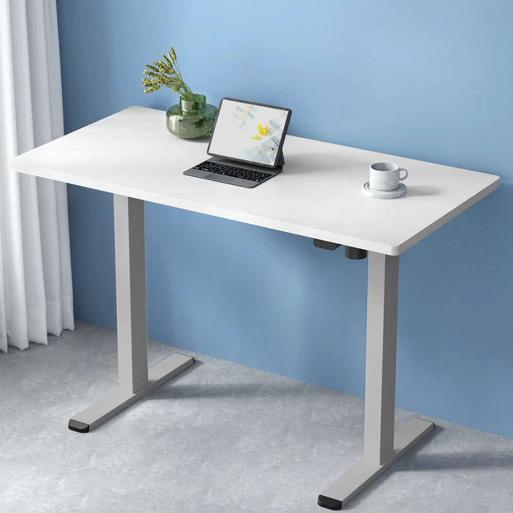 White 120cm standing desk with drawer storage and writing surface